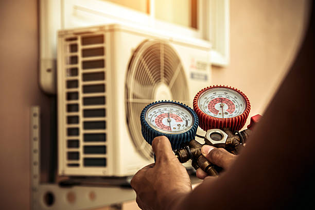 Professional Hvac technician working in Oswego, KS